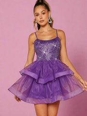 Shine Bright in Style: Sequin Layered Organza Hem Dress