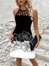 Bold and Beautiful: Black and White Printed Sleeveless Summer Dress with Netted and Spliced Design