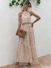 Tropical Escape: Allover Print Layered Hem Belted Halter Dress