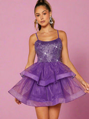 Shine Bright in Style: Sequin Layered Organza Hem Dress